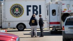 SCHERTZ, TX - MARCH 20:  FBI, ATF and local police investigate an explosion at a FedEx facility on March 20, 2018 in Schertz, Texas. A package exploded while being transported on a conveyor shortly after midnight this morning causing minor injuries to one person. The explosion is believed to be related to several recent package bombs that have been detonated in Austin, Texas, about an hour's drive from Schertz.  (Photo by Scott Olson/Getty Images)