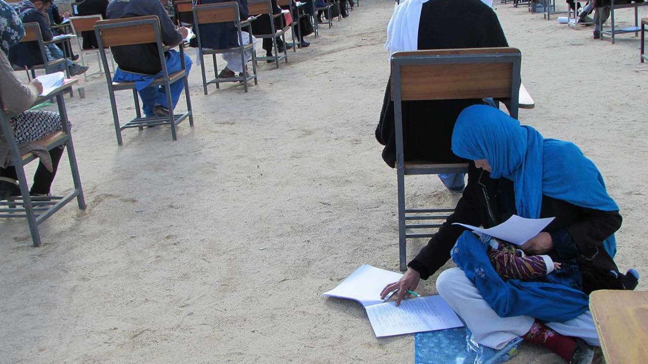 Jahan Taab, 25, taking Kankor exam in in Afghanistan's Daykundi province