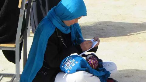 03 afghan mother nursing exam