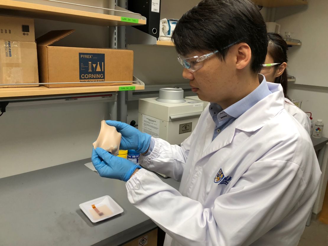 Benjamin Tee in research facilities working on stretchable materials for his team's electronic skin.