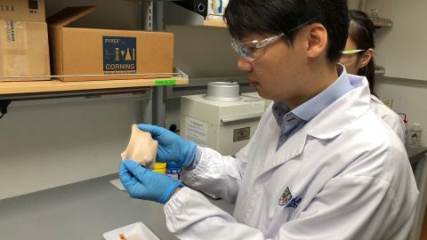 Benjamin Tee in research facilities working on stretchable materials for his team's electronic skin.