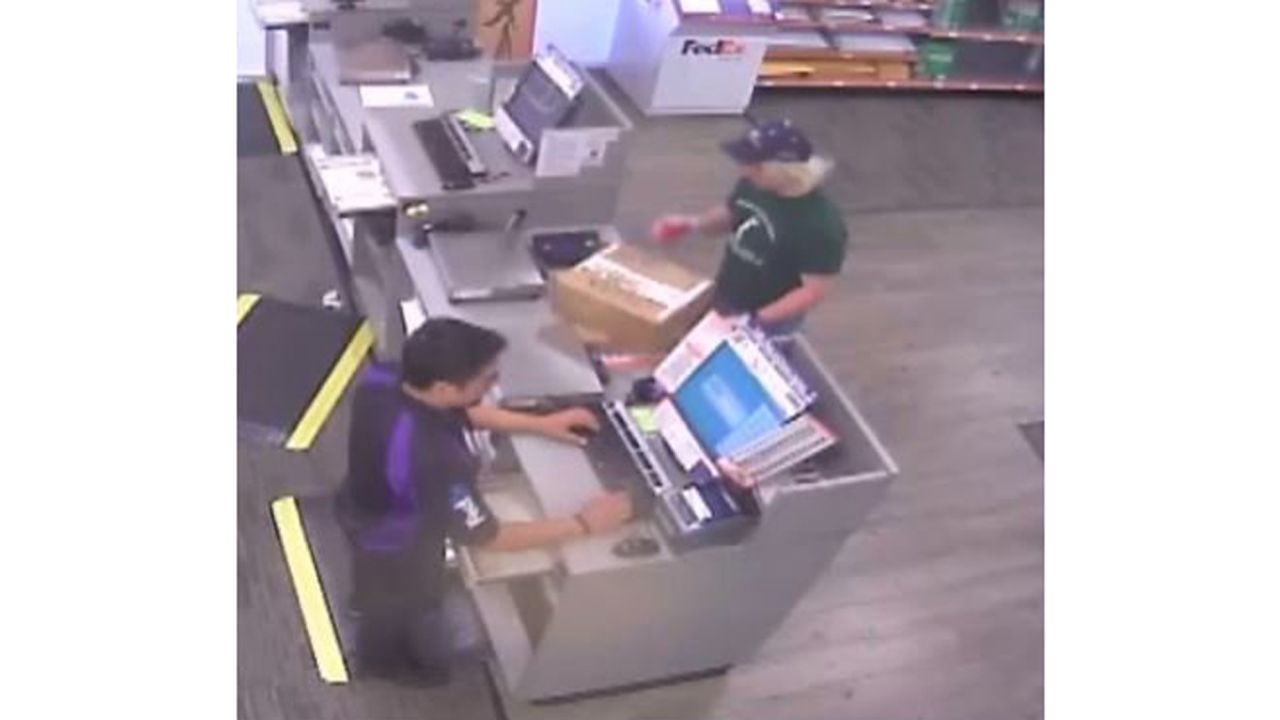 A security camera captured this image of Conditt, in a wig, at a FedEx store.