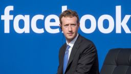 Mark Zuckerberg, chief executive officer of Facebook Inc., listens as Narendra Modi, India's prime minister, not pictured, speaks during a town hall meeting at Facebook headquarters in Menlo Park, California, U.S., on Sunday, Sept. 27, 2015. Prime Minister Modi plans on connecting 600,000 villages across India using fiber optic cable as part of his "dream" to expand the world's largest democracy's economy to $20 trillion. Photographer: David Paul Morris/Bloomberg via Getty Images 