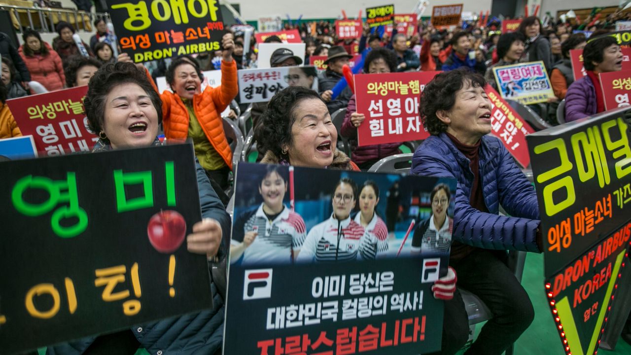 Local fans gather in their thousands in the Uiseong Gymnasium to cheer on the Garlic Girls in the Olympic final.