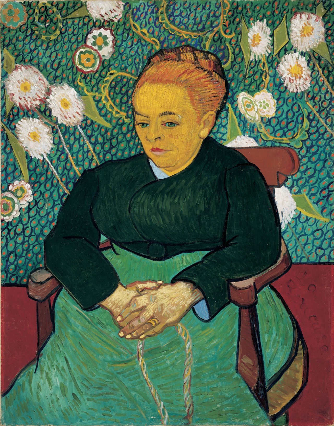 Van Gogh incorporated many elements of Japanese art into his work, including strong outlines, bold colors and the absence of shadows, as seen in "Woman Rocking the Cradle (Augustine Roulin)" (1889). 
