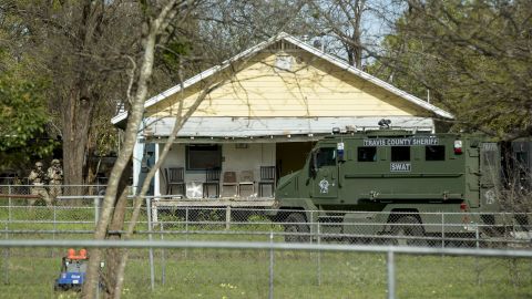 Authorities surround the home of the Austin bombing suspect Mark Conditt in Pflugerville, Texas, on Wednesday.