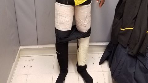 Photo from US Customs and Border Protection shows nine pounds of cocaine taped to suspect's leg 