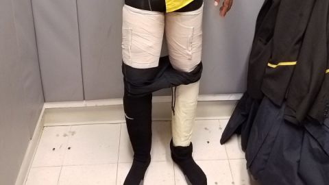 Photo from US Customs and Border Protection shows nine pounds of cocaine taped to suspect's leg