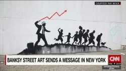 exp Banksy street art sends a message in NYC_00002001.jpg