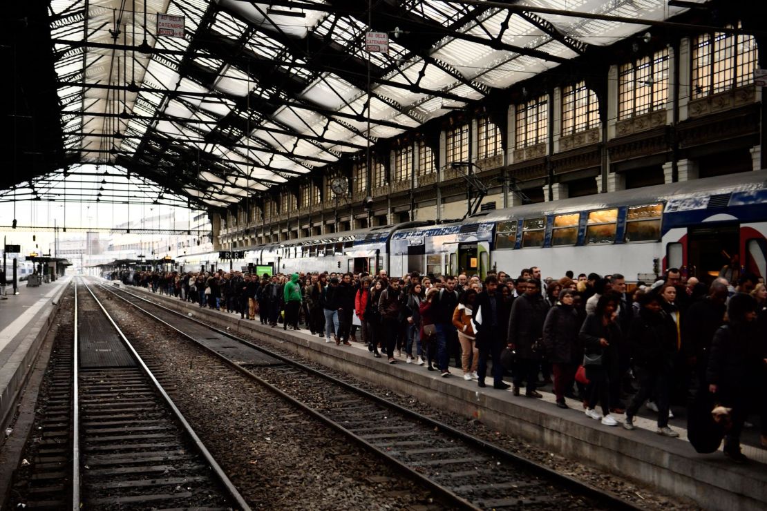 People disembark from a Paris suburban train at the Gare de Lyon railway station on Thursday.