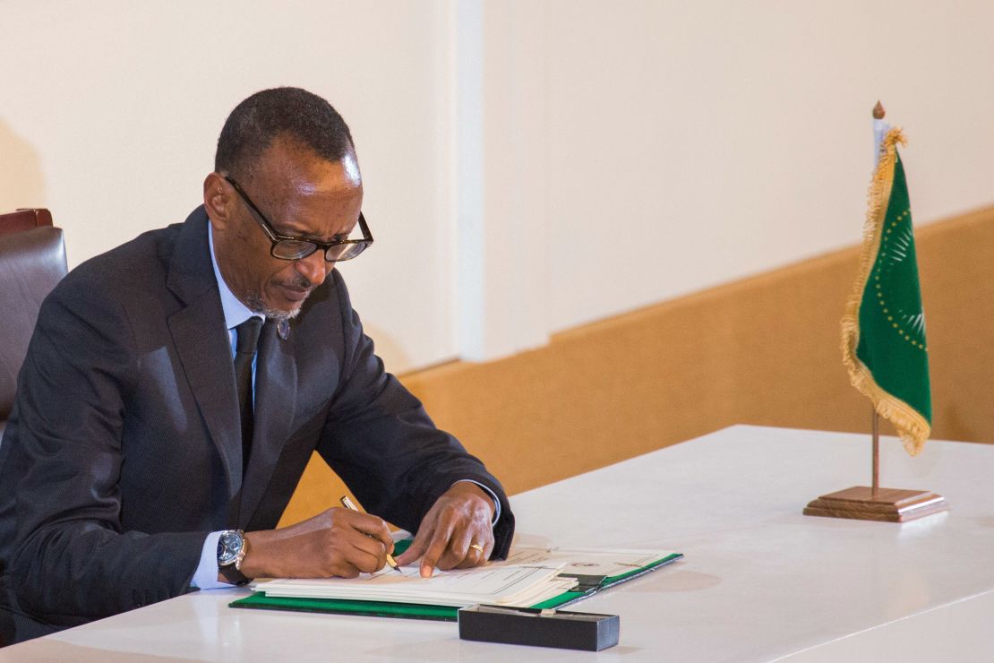 Rwanda's President Paul Kagame signs an agreement for establishing the African Continental Free Trade Area.