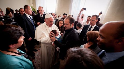 Pope Francis blesses Stella Almubayed, the first baby born in Italy to Syrian refugees.
