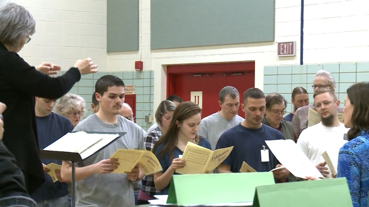 Prisoners at the Oakdale Prison in Iowa and community volunteers practice singing Beethoven's "Prisoners Song."