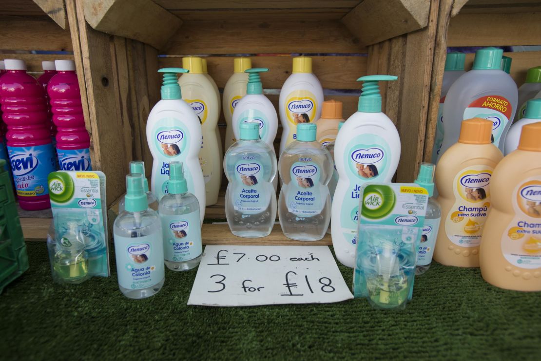 Products labeled in Spanish on display at Gibbons' stall.