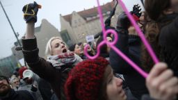 Protesters march against planned restrictions on abortions in Poland.