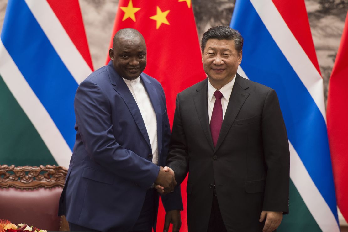 Gambia's President Adama Barrow with China's President Xi Jinping at the end of a signing ceremony at the Great Hall of the People in Beijing on December 21, 2017.
The two countries re-established diplomatic relations in 2016.