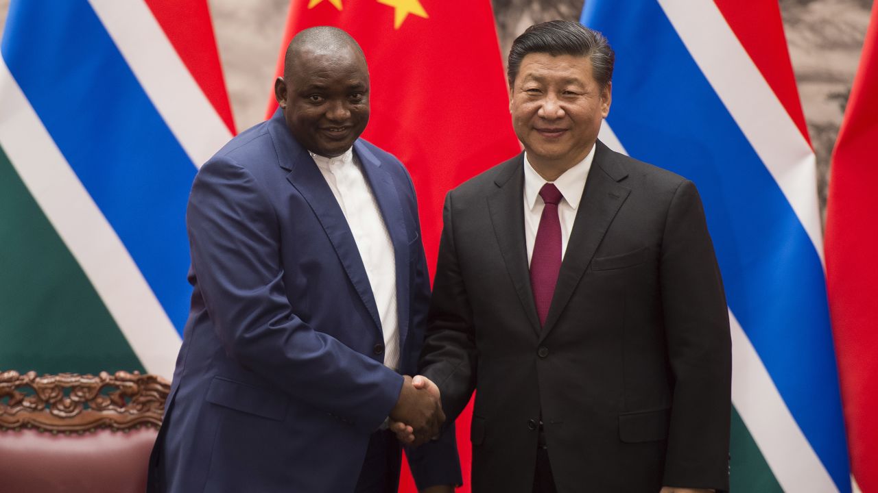 Gambia's President Adama Barrow with China's President Xi Jinping at the end of a signing ceremony at the Great Hall of the People in Beijing on December 21, 2017.
The two countries re-established diplomatic relations in 2016.