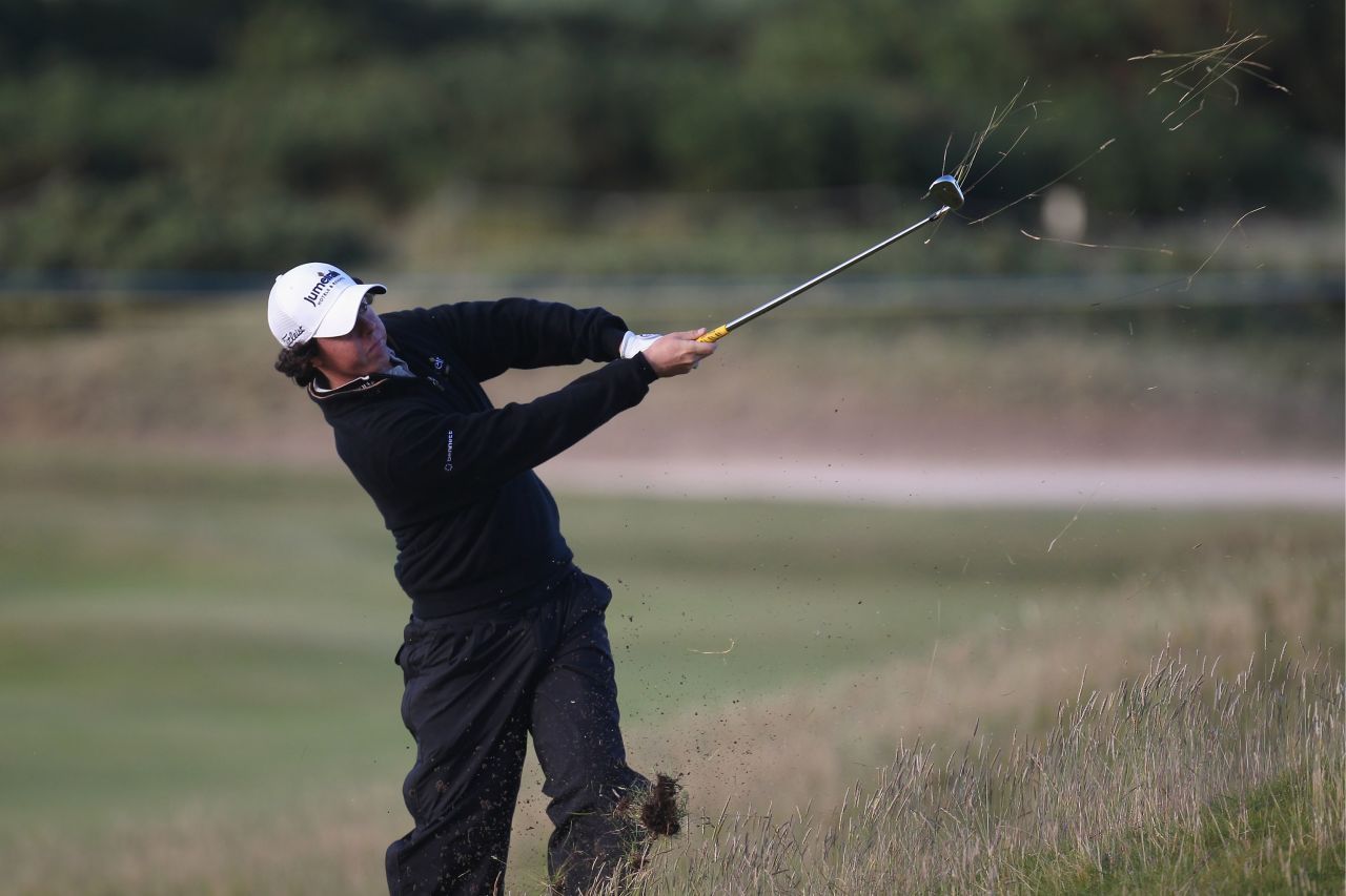 <strong>Blown off course:</strong> But he struggled to cope with wild winds on day two and dropped back before battling to a distant third place behind South African Louis Oosthuizen.