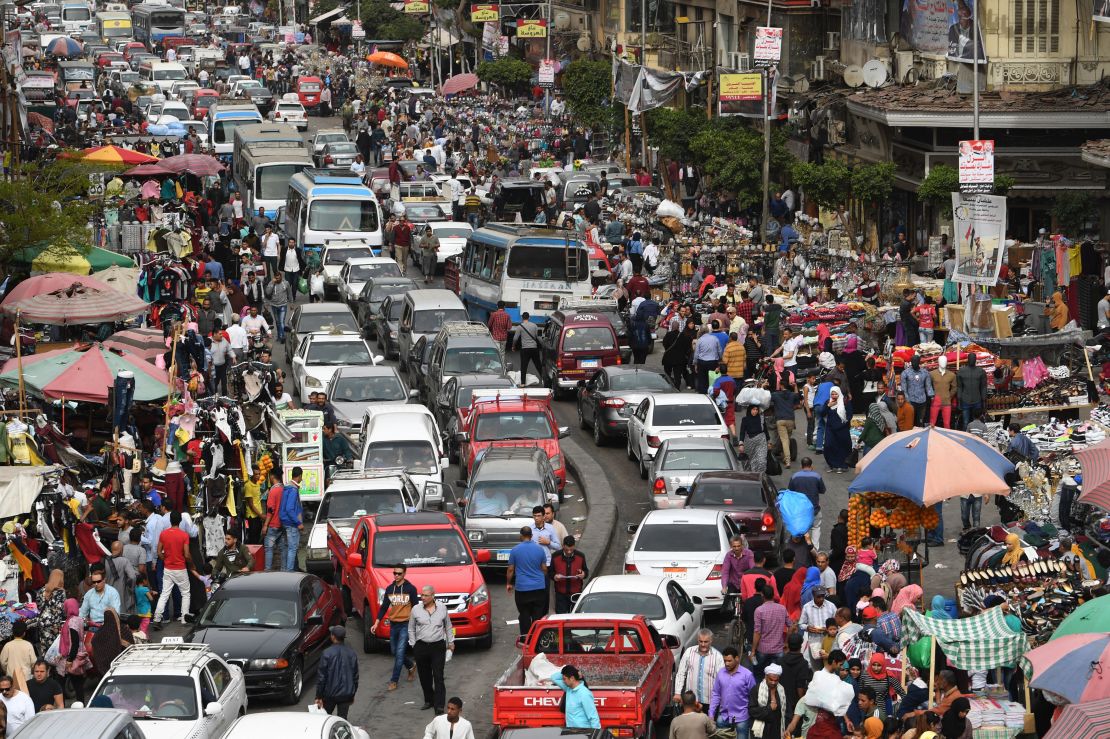 Egyptian drivers stuck in congestion this month by the El Ataba open-air market in Cairo.