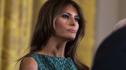 WASHINGTON, DC - MARCH 15: First lady Melania Trump looks on as United States President Donald J. Trump speaks during the Shamrock Bowl Presentation at the White House on March 15, 2018 in Washington, D.C.   (Photo by Alex Edelman-Pool/Getty Images)