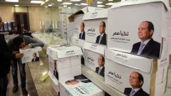 Members of Egyptian President Abdel Fattah al-Sisi's presidential campaign staff stand next to boxes containing signatures in his support, needed to register for the elections, at the National Election Authority, in Cairo on January 24, 2018.
Egyptian leader Abdel Fattah al-Sisi formally submitted his candidacy for presidential elections in March that he looks certain to dominate as a string of potential challengers have dropped out.   / AFP PHOTO / MOHAMED EL-SHAHED        (Photo credit should read MOHAMED EL-SHAHED/AFP/Getty Images)