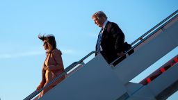 Barron Trump (L), US first lady Melania Trump (C) and US President Donald Trump arrive at Palm Beach International Airport March 23, 2018 in West Palm Beach, Florida before heading to Mar-a-Lago for the weekend on March 23, 2018.  / AFP PHOTO / Brendan Smialowski        (Photo credit should read BRENDAN SMIALOWSKI/AFP/Getty Images)