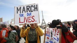 PARIS, FRANCE - MARCH 24: A large group of Americans and French hold a March for Our Lives  anti-NRA anti-gun rally on Place de Trocadero, facing the Eiffel Tower, on March 24, 2018 in Paris, France. More than 800 March for Our Lives events, organized by survivors of the Parkland, Florida school shooting on February 14 that left 17 dead, are taking place around the world to call for legislative action to address school safety and gun violence.  (Photo by Owen Franken - Corbis/Corbis via Getty Images) (Photo by Owen Franken - Corbis/Corbis via Getty Images)