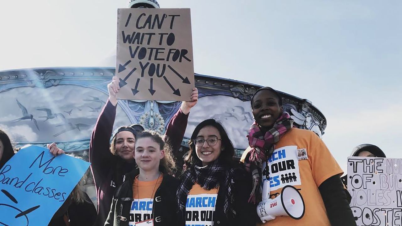 Leah Barterian held this sign at the march in Detroit.