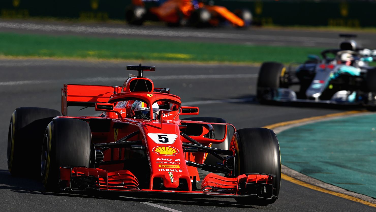 Sebastian Vettel of Germany leads Lewis Hamilton on his way to victory in the 2018 Australian Grand Prix in Melbourne.