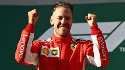 Race winner Sebastian Vettel of Germany celebrates on the podium of the 2018 Australian Grand Prix.