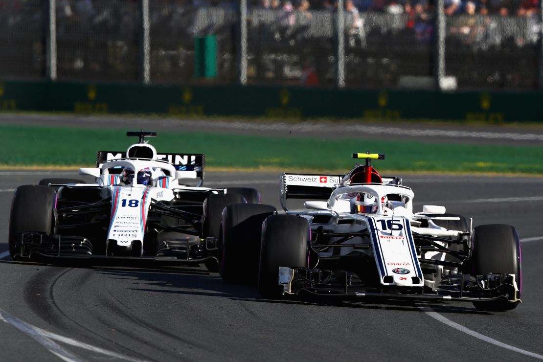 Leclerc battles to stay ahead of Lance Stroll of Williams during his Formula 1 debut in the season-opener at the Australian Grand Prix.
