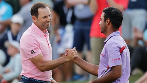 Sharma shakes hands with reigning Masters champion Sergio Garcia after losing to the Spaniard in March's WGC Match Play.