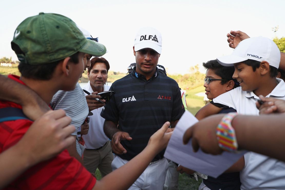 Sharma greets fans and journalists at the Hero Indian Open in New Delhi in March 2018.