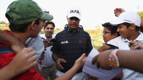 Sharma greets fans and journalists at the Hero Indian Open in New Delhi in March 2018.