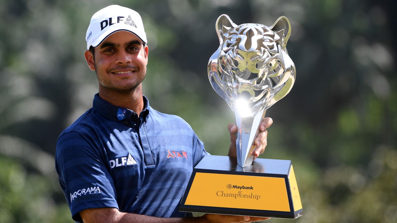 KUALA LUMPUR, MALAYSIA - FEBRUARY 04:  Shubhankar Sharma of India poses with the trophy after winning the Maybank Championship Malaysia at Saujana Golf and Country Club on February 4, 2018 in Kuala Lumpur, Malaysia  (Photo by Ross Kinnaird/Getty Images)
