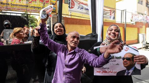 Sisi supporters pictured outside a polling station in Cairo. 
