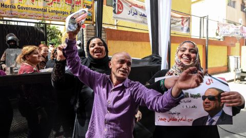 Sisi supporters pictured outside a polling station in Cairo.