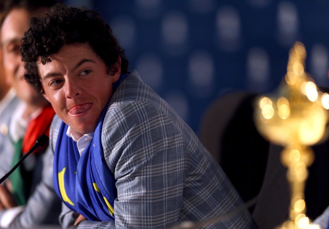 <strong>Running late:</strong> An alarm clock episode meant McIlroy needed a police escort to make the course on time but he succeeded in winning his Sunday singles match to help Europe pull off the "Miracle of Medinah" in the Ryder Cup in Chicago.