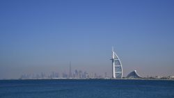 A picture taken on March 14, 2018 shows the skyline of Dubai with the Burj al-Arab in the foreground and the Burj Khalifa (L) in the background.  / AFP PHOTO / GIUSEPPE CACACE        (Photo credit should read GIUSEPPE CACACE/AFP/Getty Images)