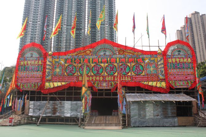 This bamboo theater in Ap Lei Chau, Hong Kong, has been built to honor the sea god of Hung Shing. Bamboo theaters are elaborate pop-up structures erected annually to host Cantonese opera performances.