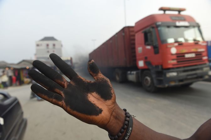 A soot-covered hand. 