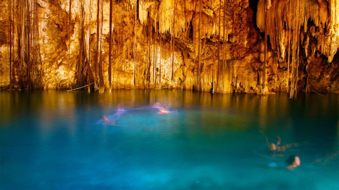 <strong>Chichen Itza:</strong> This former Mayan city, like many Mayan ruins, is home to cenotes, or sinkholes full of water you can swim in.