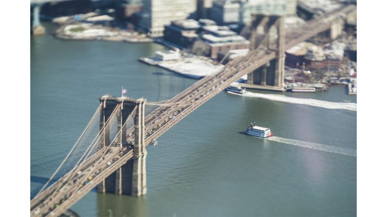 <strong>Tilt shift shots</strong>: Léonard uses a tilt-shift lens and shoots from rooftops or helicopters.