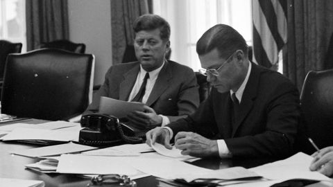 President Kennedy and Defense Secretary Robert McNamara confer on the crisis in October 1962.