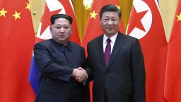 In this photo provided Wednesday, March 28, 2018, by China's Xinhua News Agency,  North Korean leader Kim Jong Un, left, and Chinese President Xi Jinping shake hands in Beijing, China. The Chinese government confirmed Wednesday that North Korea's reclusive leader Kim went to Beijing and met with Chinese President Xi in his first known trip to a foreign country since he took power in 2011. The official Xinhua News Agency said Kim made an unofficial visit to China from Sunday to Wednesday.(Ju Peng/Xinhua via AP)