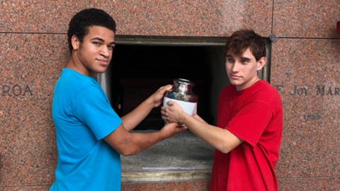 Zachary and Nikolas Cruz with their mother's ashes after her funeral in 2017.
