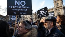 LONDON, ENGLAND - MARCH 26: Protesters hold placards as they demonstrate in Parliament Square against anti-Semitism on March 26, 2018 in London, England. The Board of Deputies of British Jews and the Jewish Leadership Council have drawn up a letter accusing Labour Leader Jeremy Corbyn of failing to address anti-Semitism in his party. Mr Corbyn has today apologised to Jewish groups for "pockets of anti-Semitism" in Labour. (Photo by Jack Taylor/Getty Images)