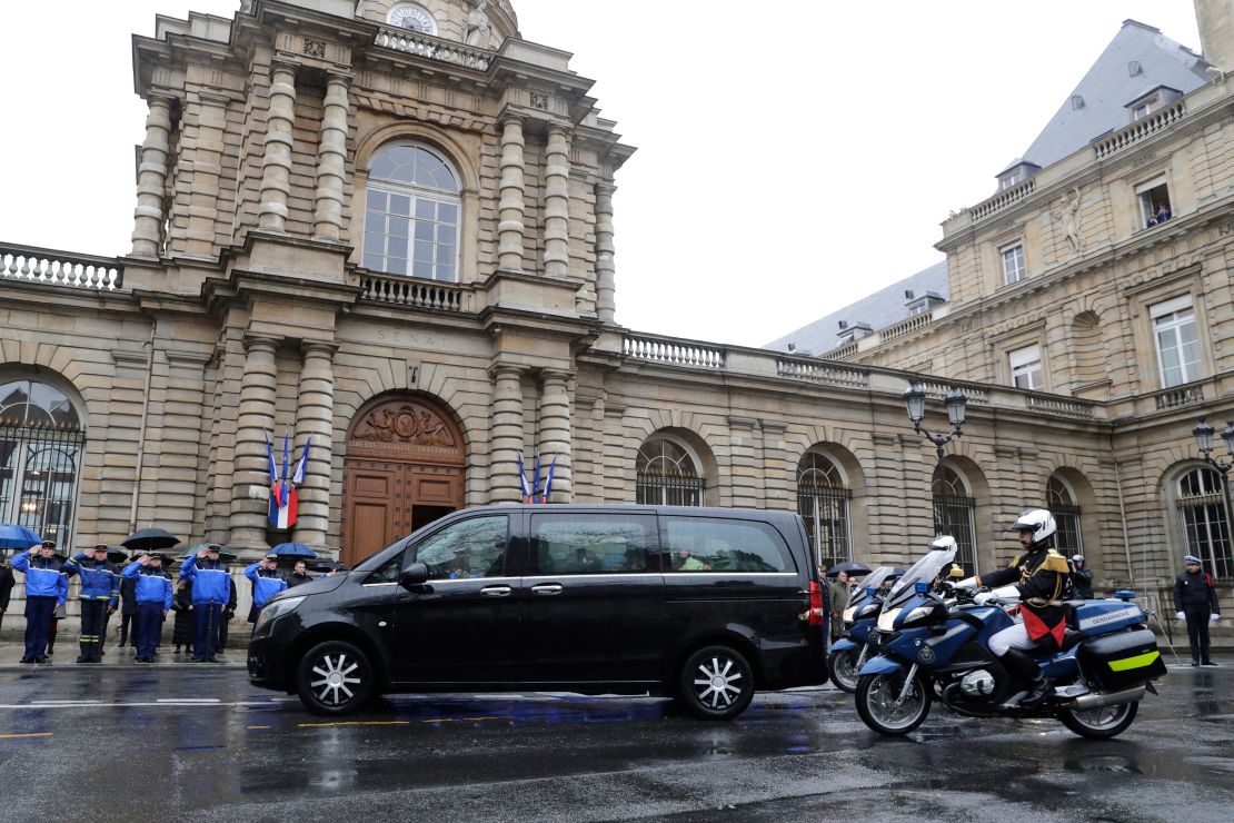 Republican Guards escort the hearse transporting the coffin of  Lt. Col.  Arnaud Beltrame.