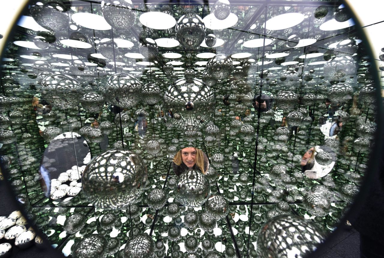 "INFINITY MIRRORED ROOM: LET'S SURVIVE TOGETHER" (2017) by Yayoi Kusama.
