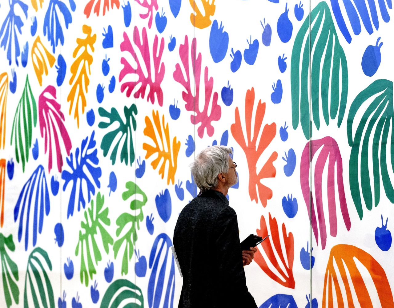 A visitor examines "La Perruche et la Sirene" by French artist Henri Matisse at the exhibition "De Oase van Matisse" at the Stedelijk Museum Amsterdam in 2015. 
